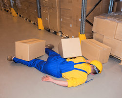 Man injured in a warehouse, three day first aid at work training available throughout Lincolnshire